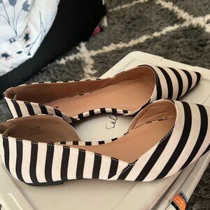 Black and white striped flats.